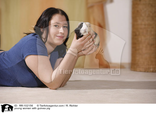 young woman with guinea pig / RR-102156