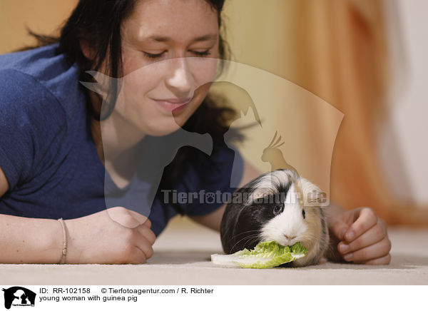 young woman with guinea pig / RR-102158