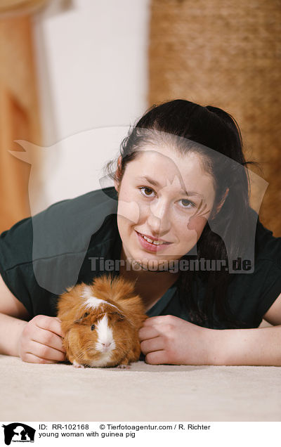 young woman with guinea pig / RR-102168