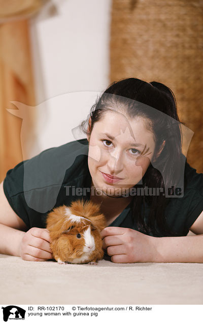 young woman with guinea pig / RR-102170