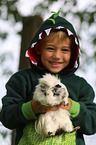 boy and guinea pig