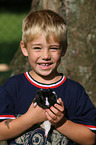 boy and guinea pig