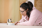 young woman with guinea pig