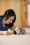 young woman with guinea pig