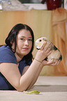 young woman with guinea pig