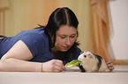 young woman with guinea pig