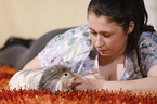 young woman with guinea pig