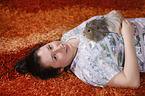 young woman with guinea pig