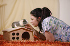 young woman with guinea pig