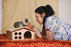 young woman with guinea pig