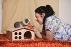 young woman with guinea pig