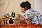 young woman with guinea pig